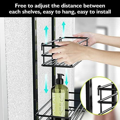 Hands adjusting black wall shelves with bottle on lower shelf.
