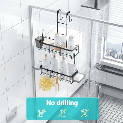 Shower caddy with toiletries hanging over glass door