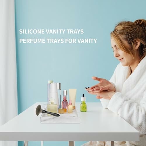 Woman in robe with vanity products on a table